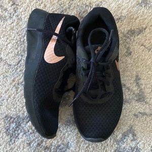 Nike black and gold shoes